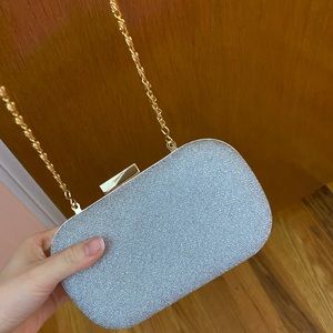 Silver and gold clutch purse